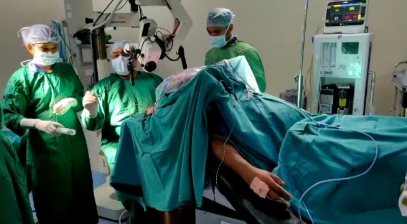 Joyful patient sings during brain surgery in central India