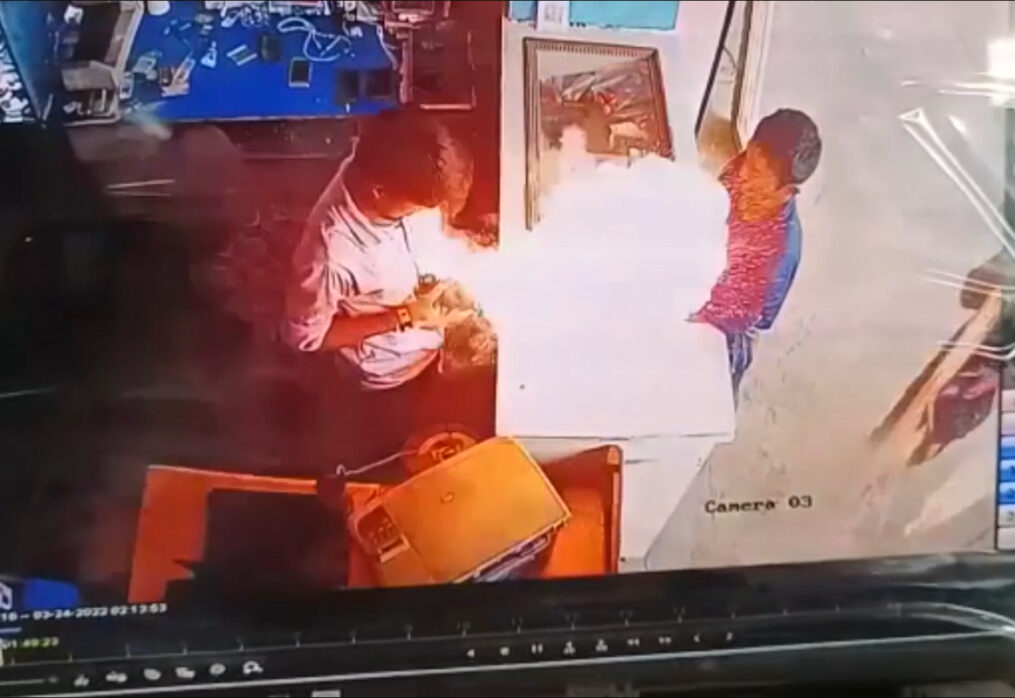 Chilling moment mobile explodes in shopkeeper’s hand in central India