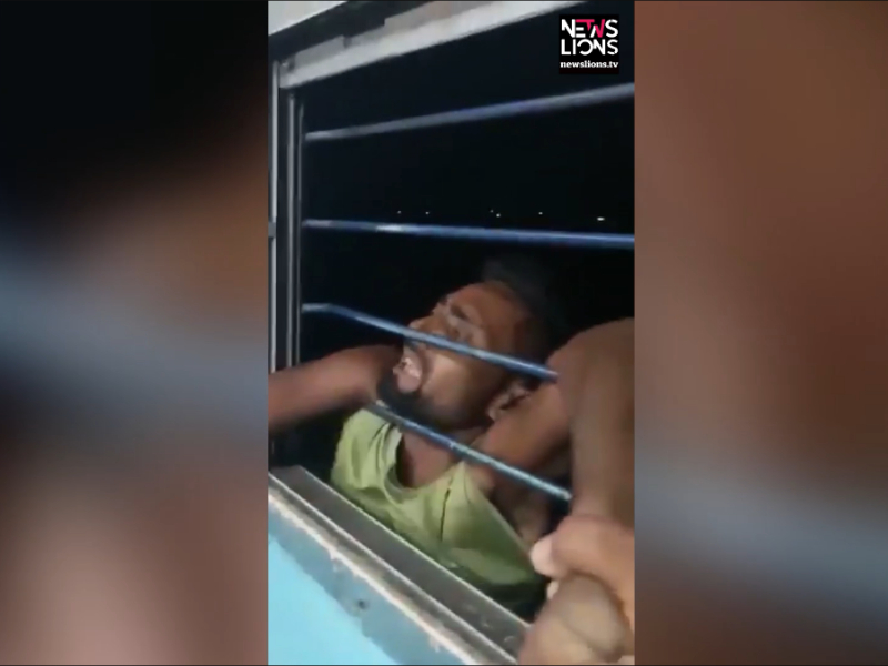 Thief tries to steal phone from moving train, ends up hanging from window after passengers hold him in northern India