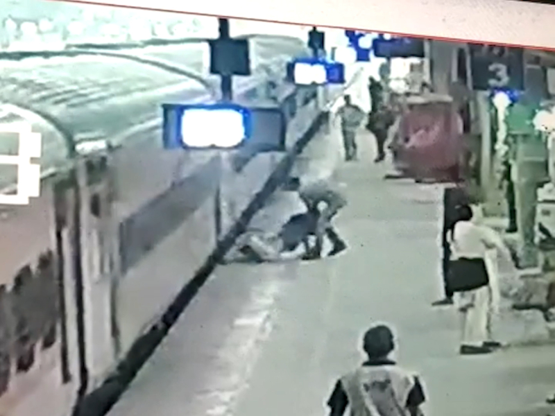 Vigilant policemen save man who lost balance while trying to board moving train in northern India