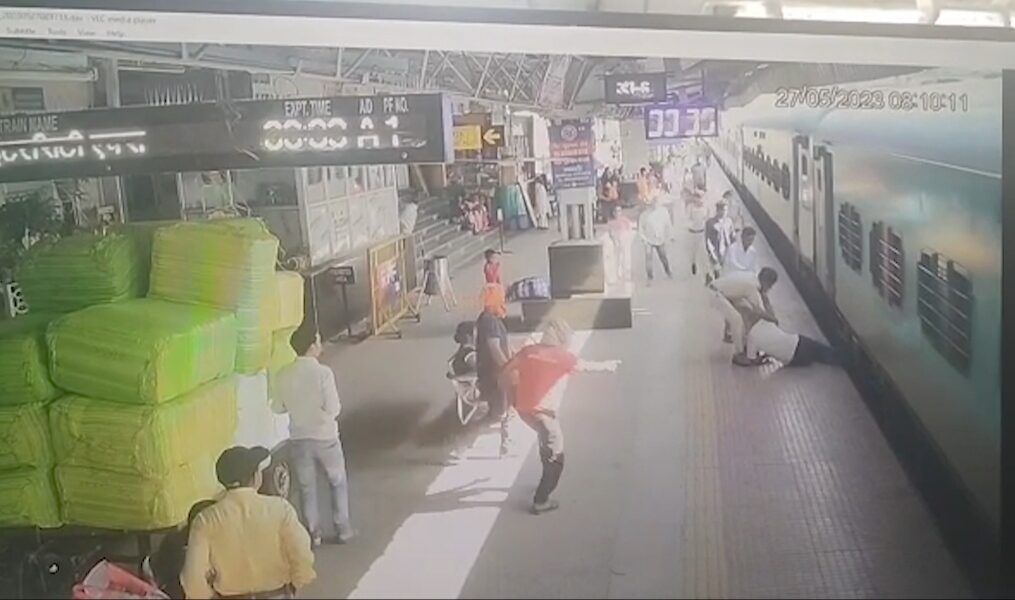 Elderly passenger slips while boarding moving train in eastern India, saved