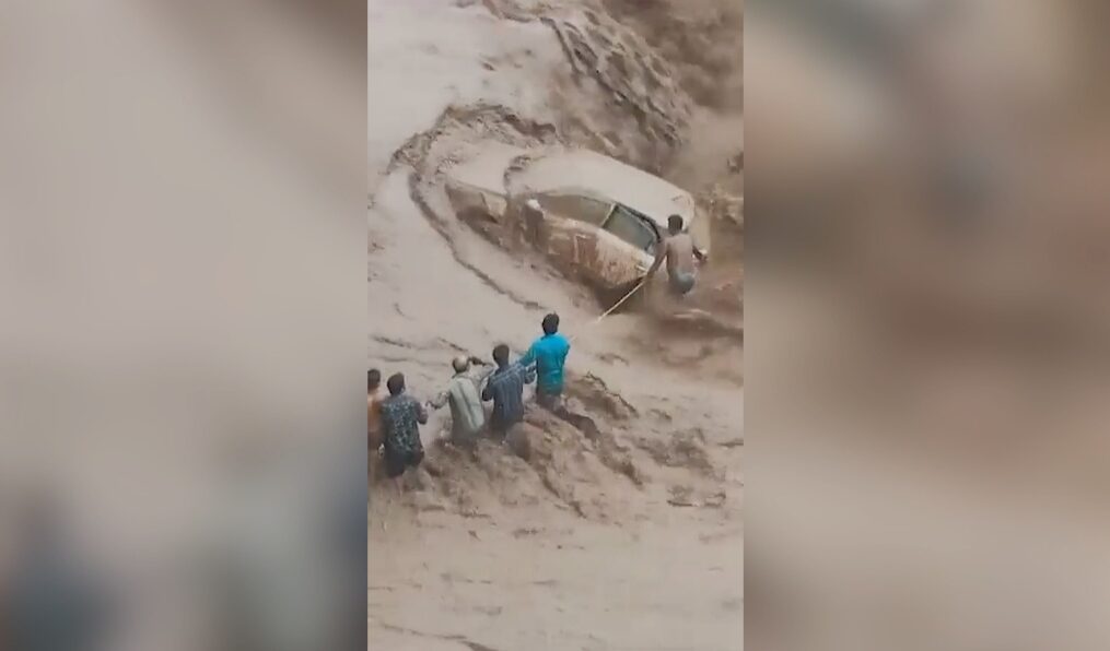 Locals rescue woman after her car gets washed away in northern India