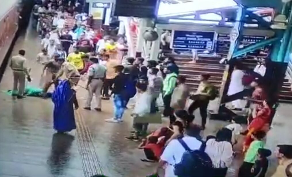 Woman loses balance while trying to get down moving train in central India