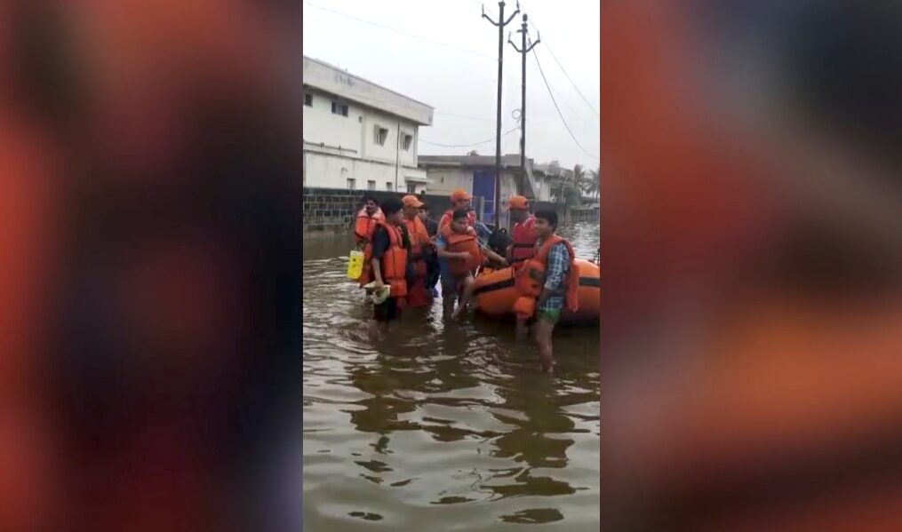 Officials conduct rescue operations in flood-hit western India