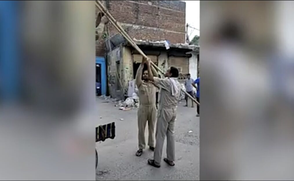 Fire department officials rescue bird stuck in electric pole in northern India