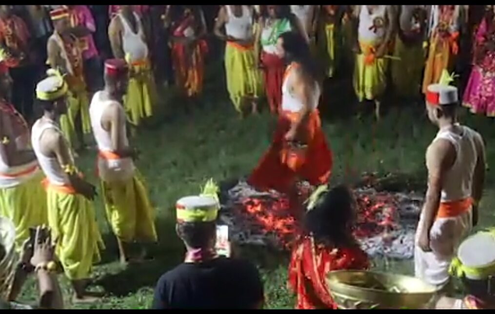 Devotees walk on burning embers during rituals as part of festival in northern India