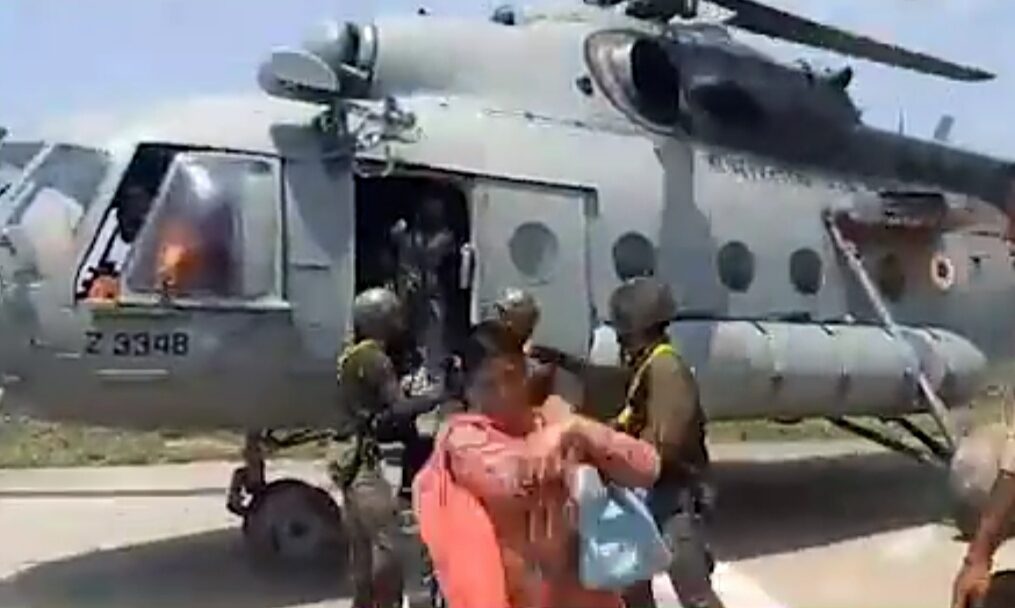 People stranded in rain-affected areas being taken to relief camps in northern India