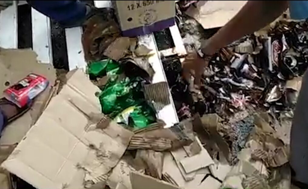Overturned liquor van spills load worth lakhs in southern India, locals quick to gather