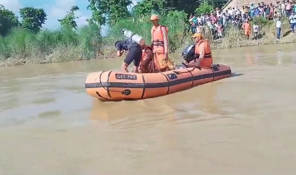 Officials conduct rescue operation after boat capsizes in northern India