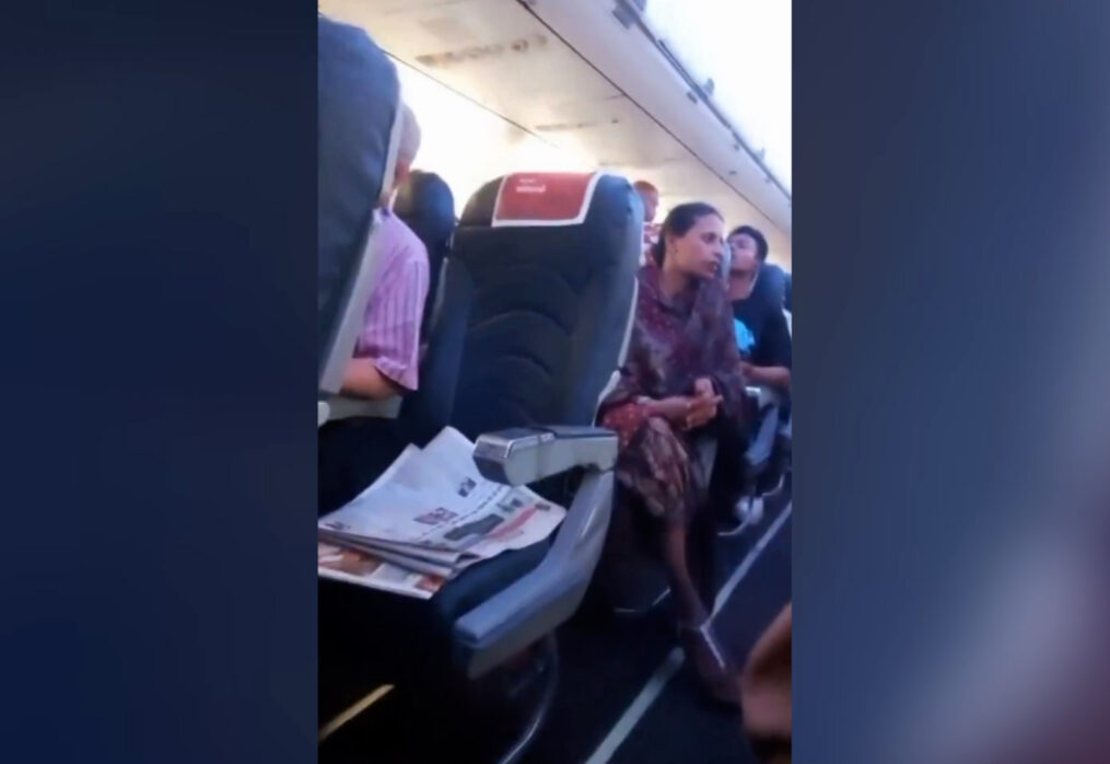 Chaos unfolds as two unruly passengers attempt to storm cockpit, causing major flight delay