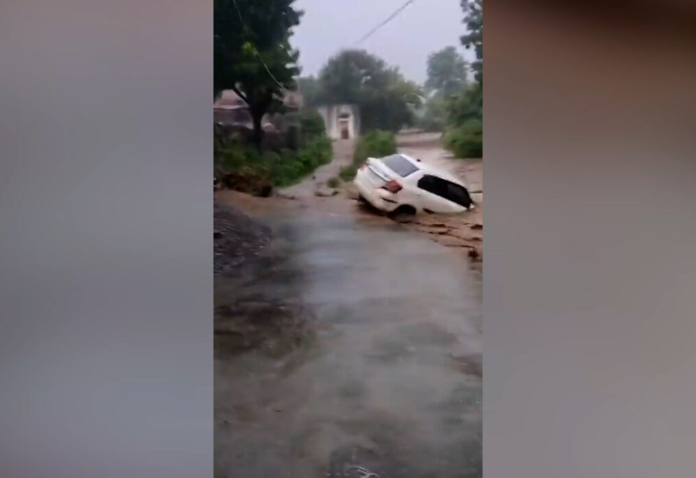 Strong current sweeps car as roads turn into raging rivers amid heavy rain